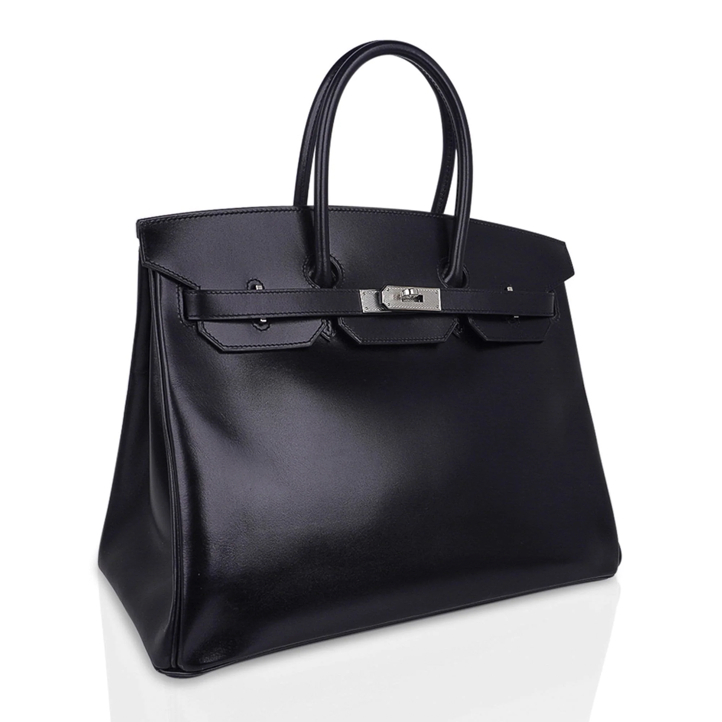 Sleek Jet Black Mirror-Sheen Polished Roomy Structured Hand Tote With Fine Tight Edge Stitching, Intricately Engraved Silvery Twist Lock Hardware And Matching Glossy Tag Etched Striped Metal Padlock Charm